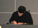 034-milo-signing.small.jpg