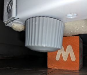 Similar view, but this time there is no metal assembly, just the wide cylinder attached directly to the bottom of the unit. 